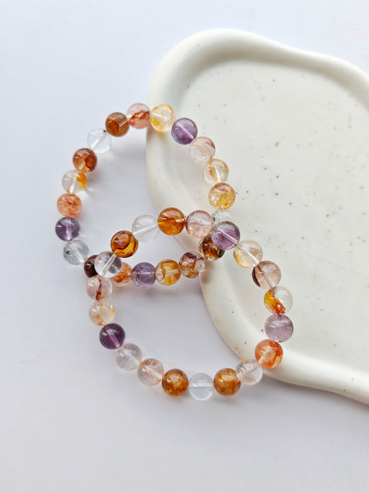 Bergkristall x Golden Healer, Feuerquarz x Amethyst Armbänder